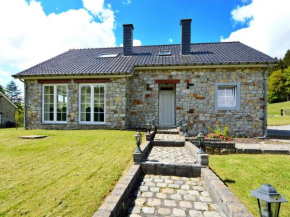 Detached natural stone house with sunny garden and terrace, modern interior